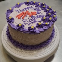 8 inch Round layered cake decorated to suit