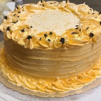 8 inch Round layered cake decorated to suit